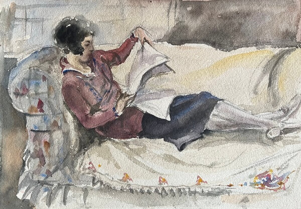 Woman on Sofa Reading Newspaper